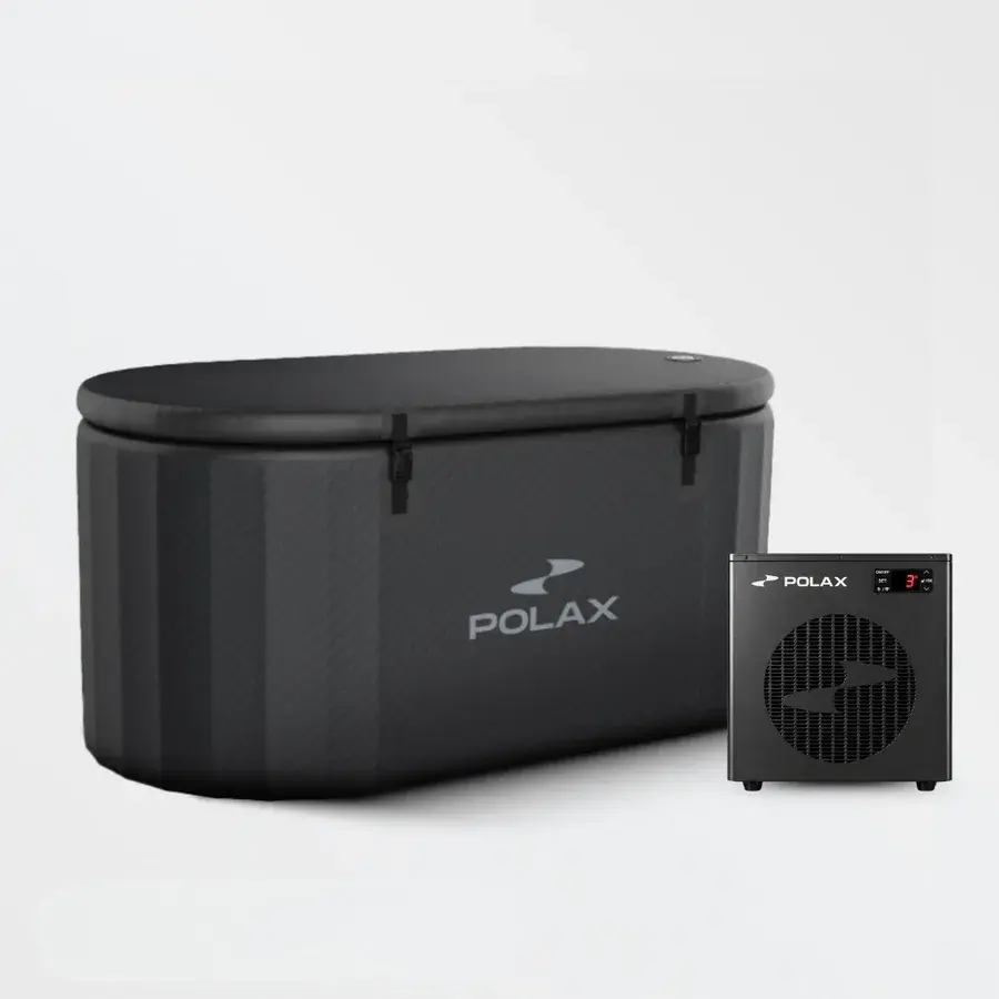 Sort ovalt Polax Air Pro isbad ved siden af en lille sort køler